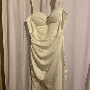 White mini dress with slit.